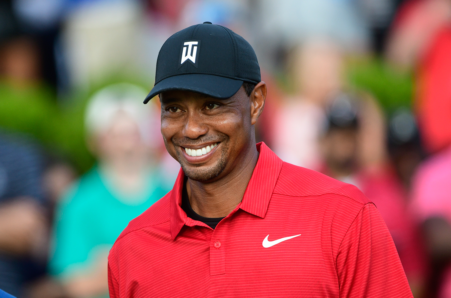 Woods sets new Masters record with 24th straight made cut