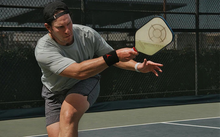 How do you increase spin on a pickleball paddle?