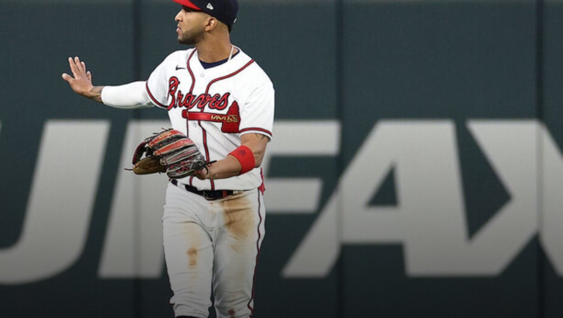 Braves fans throw cans on field after catcher interference call