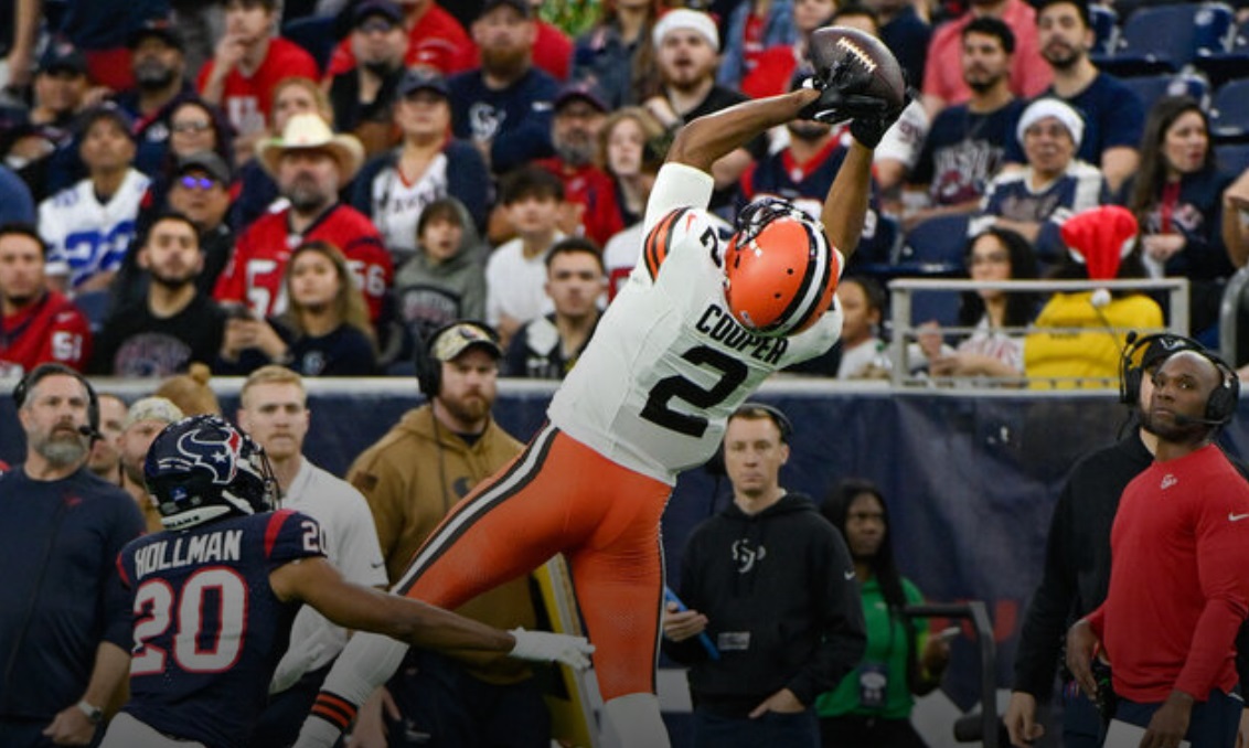 Cooper snags team-record 265 yards in Browns win