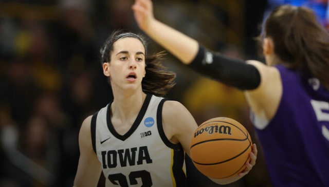 Clark has double-double as No. 1 seed Iowa defeats Holy Cross