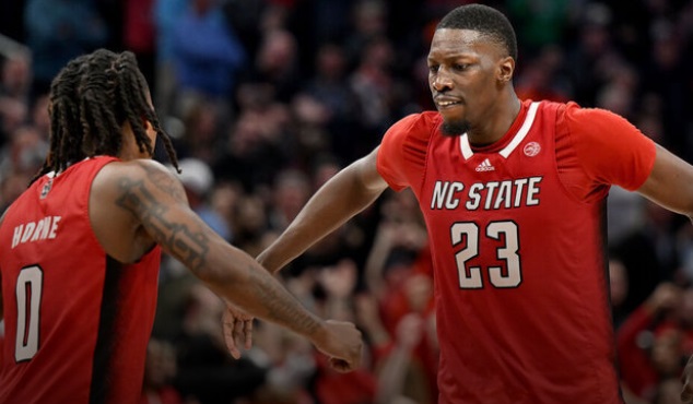 NC State keeps tourney hopes alive with dramatic OT win over Virginia