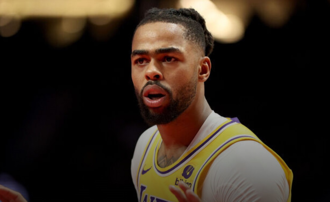 Lakers’ Russell exercises .7M option