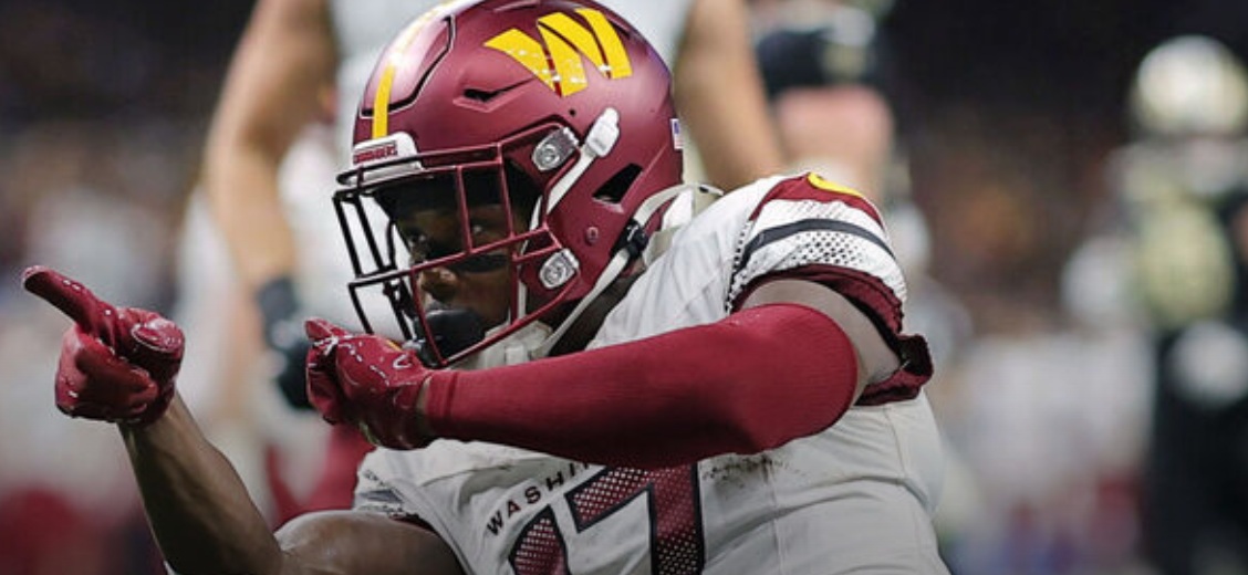 McLaurin reports to camp despite ongoing contract dispute