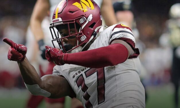 McLaurin reports to camp despite ongoing contract dispute