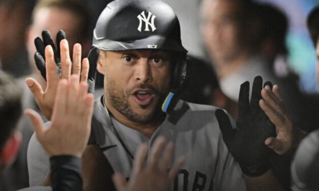 Yankees keep power surge going, hold off Rays in extras