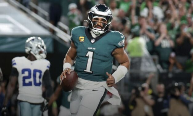 Eagles fend off Cowboys after weather delay to kick off season