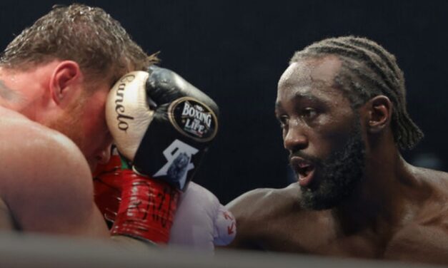 Crawford beats Canelo to become super middleweight champion